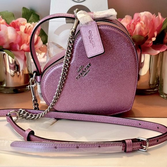 Coach Handbags - New Pink Metallic Coach Heart Bag 💗
